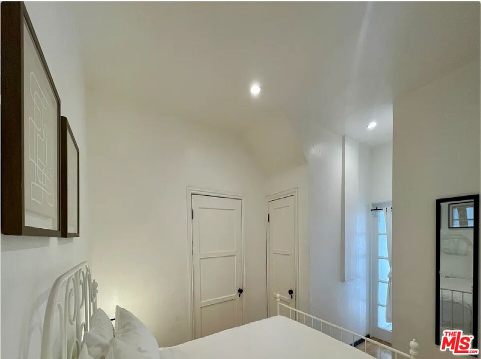 854 4th Street, Unit F Santa Monica, CA 90403 - Photo 9 of 13 a bathroom with a sink and a mirror