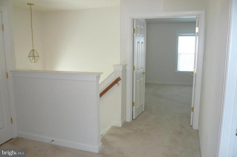 8115 Hard Shale Road Manassas, VA 20111 - Photo 15 of 26 Upper Level Hall with French Doors to MBR