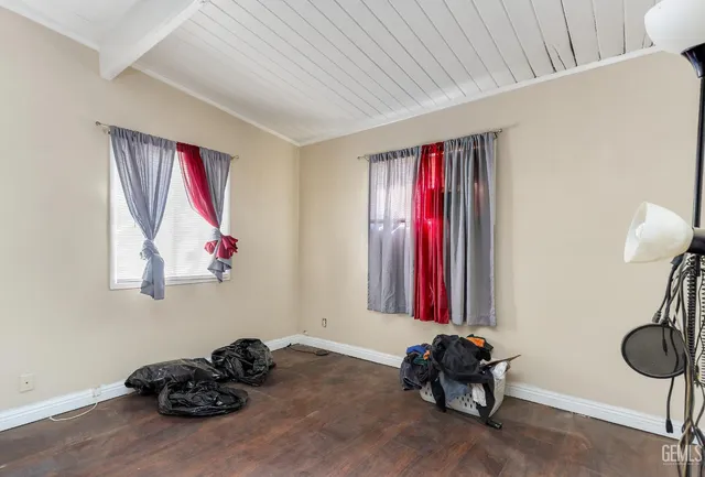 a bedroom with furniture and a bed