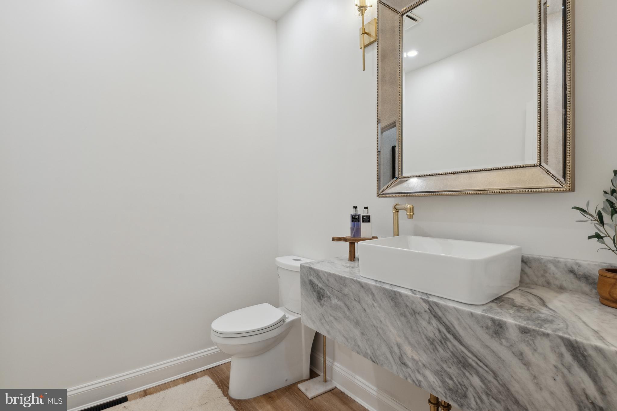 212 May Lane Edgewater, MD 21037 - Photo 13 of 68 Main level powder room with custom sink