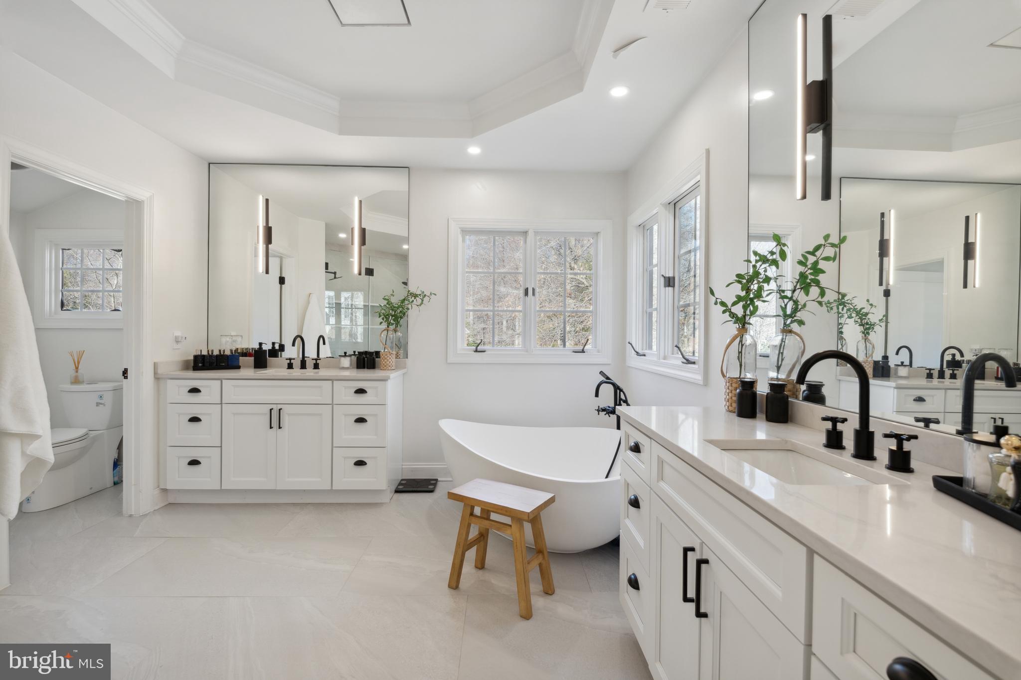 212 May Lane Edgewater, MD 21037 - Photo 30 of 68 Primary bath with custom vanities & separate tub