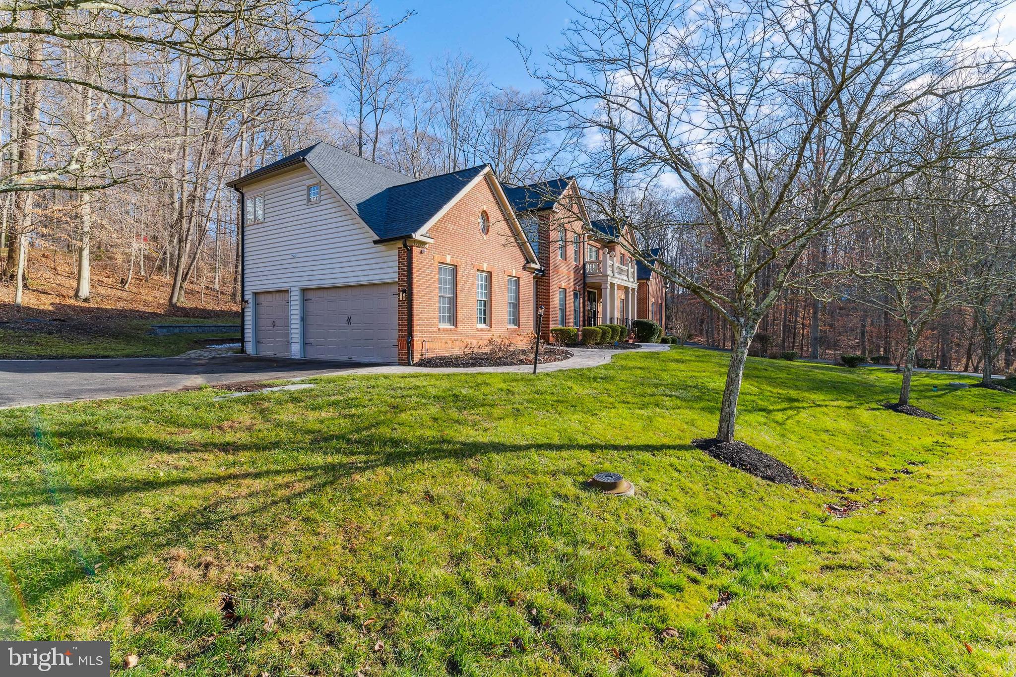 212 May Lane Edgewater, MD 21037 - Photo 3 of 68 Home features a three car side loading garage