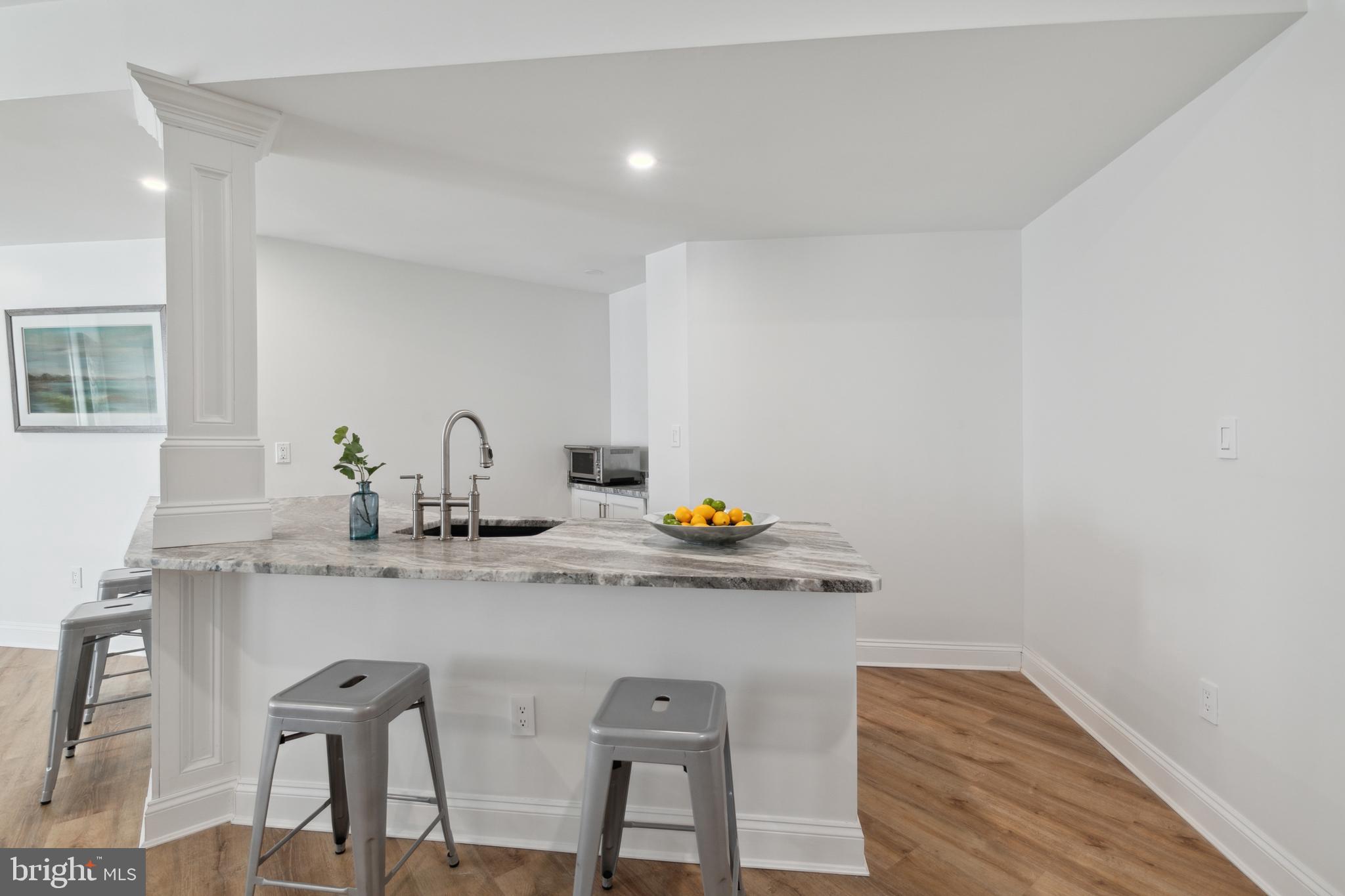 212 May Lane Edgewater, MD 21037 - Photo 45 of 68 Lower level bar/kitchenette with granite counter