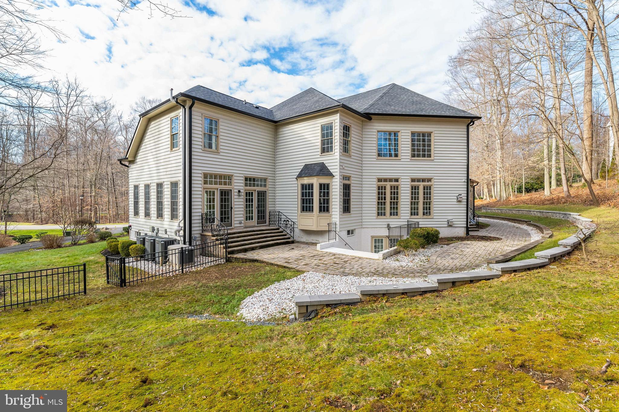 212 May Lane Edgewater, MD 21037 - Photo 52 of 68 Wooded backyard with paver patio to entertain