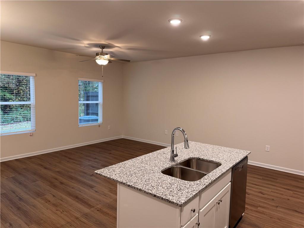 11 Huntley Trace Hoschton, GA 30548 - Photo 3 of 12 a kitchen with a sink and a window