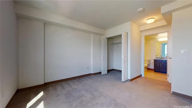 an empty room with a bathroom