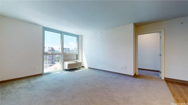 an empty room with a fireplace