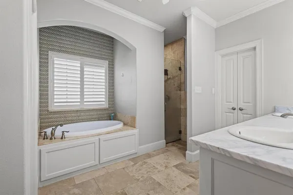 a bathroom with a sink a toilet and a bathtub