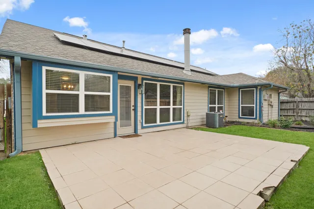 a house view with a garden space