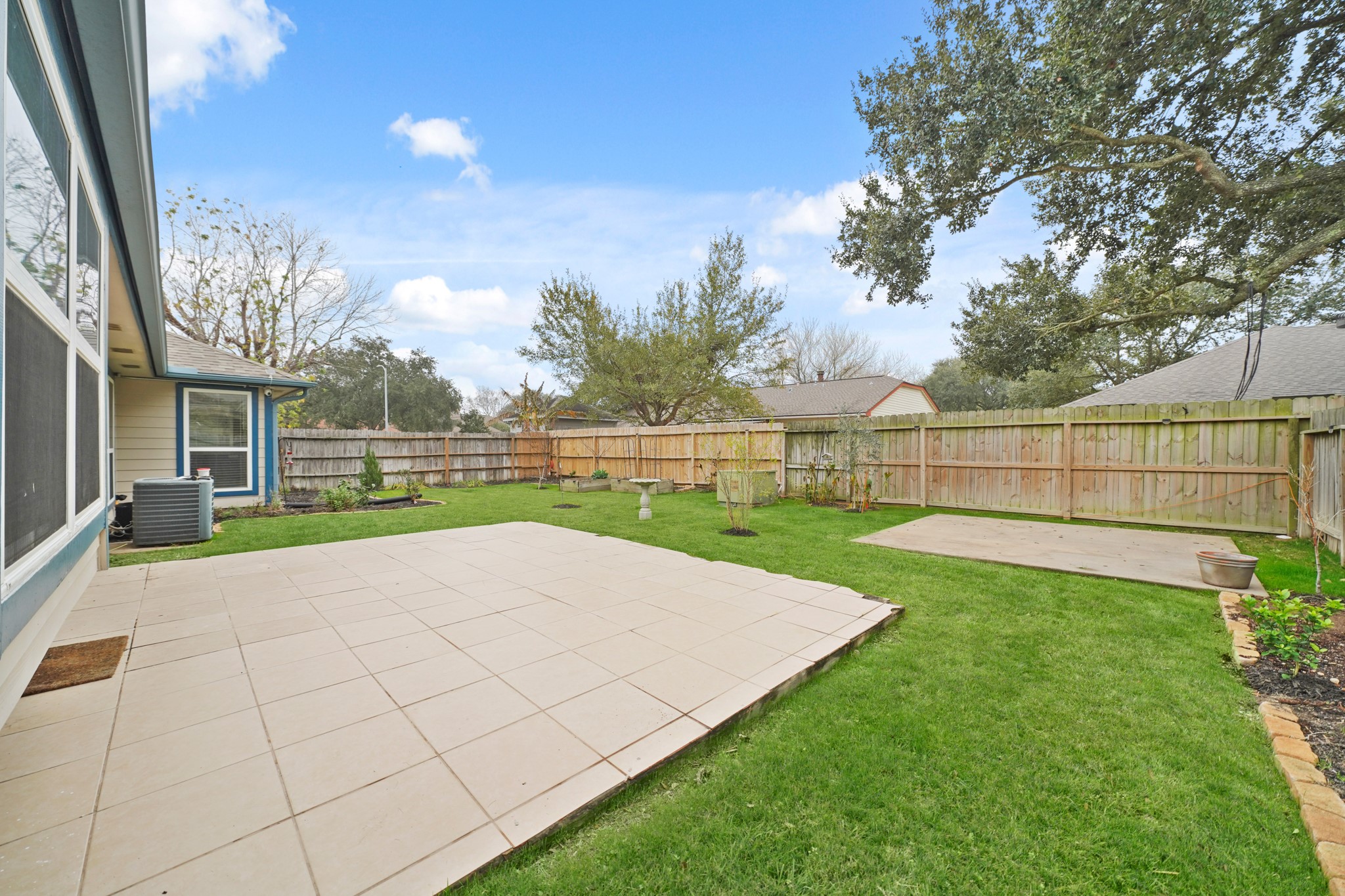 19211 Haystream Drive Katy, TX 77449 - Photo 30 of 31 a view of an house with backyard and entertaining space
