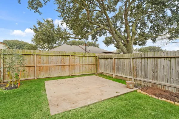 a view of a backyard with a small cabin