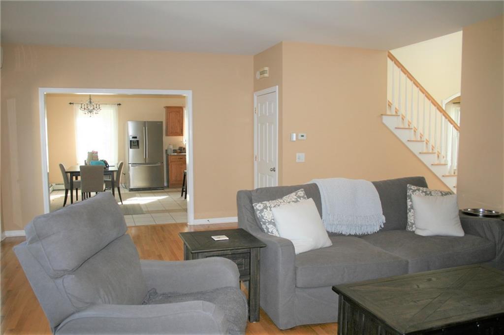 129 Town Farm Road Hampden, ME 04444 - Photo 11 of 26 Living Room looking into the Kitchen