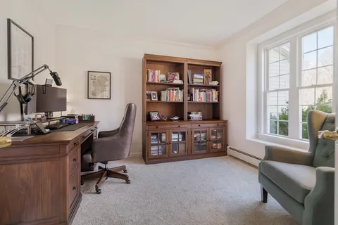 a room with a couch and a window