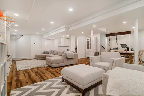 a living room with furniture and a table