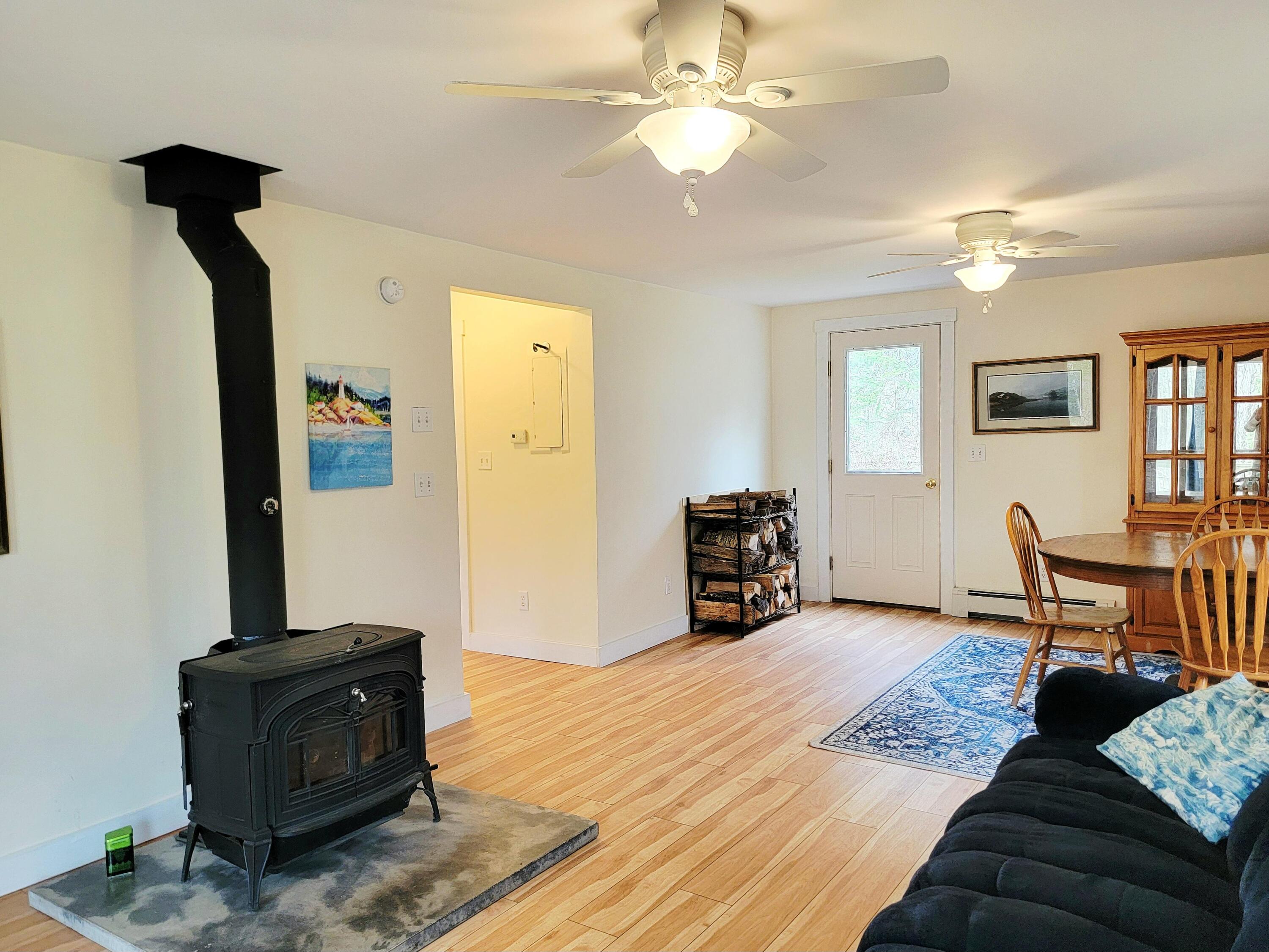 6 Skyscraper Hill Road Brooks, ME 04921 - Photo 13 of 44 Open Living and Dining Room