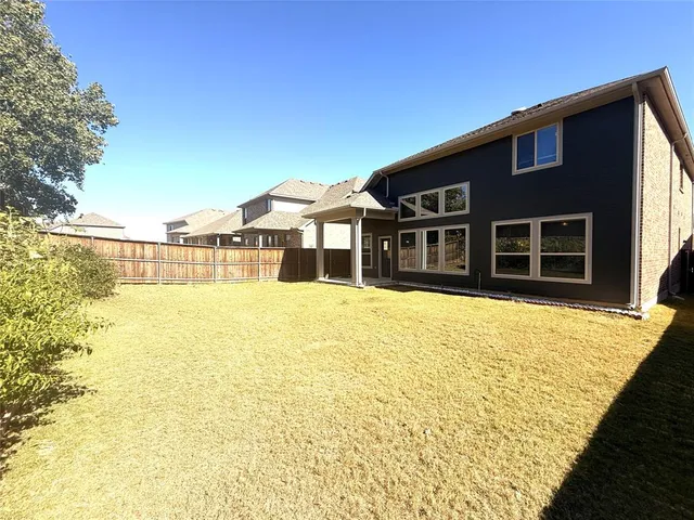 a view of a house with a swimming pool
