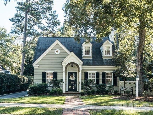 1506 Pineview Street Raleigh, NC 27608 - Photo 1 of 25 a front view of house with yard and green space