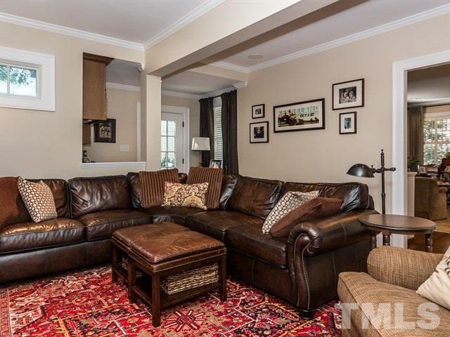 1506 Pineview Street Raleigh, NC 27608 - Photo 11 of 25 a living room with furniture and a couch
