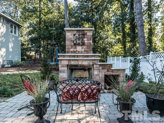 1506 Pineview Street Raleigh, NC 27608 - Photo 24 of 25 a view of house with yard and potted plants