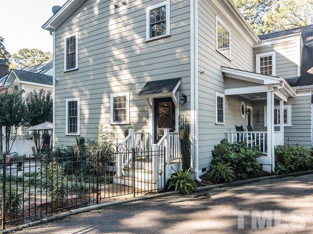 1506 Pineview Street Raleigh, NC 27608 - Photo 25 of 25 a front view of a house with a garden