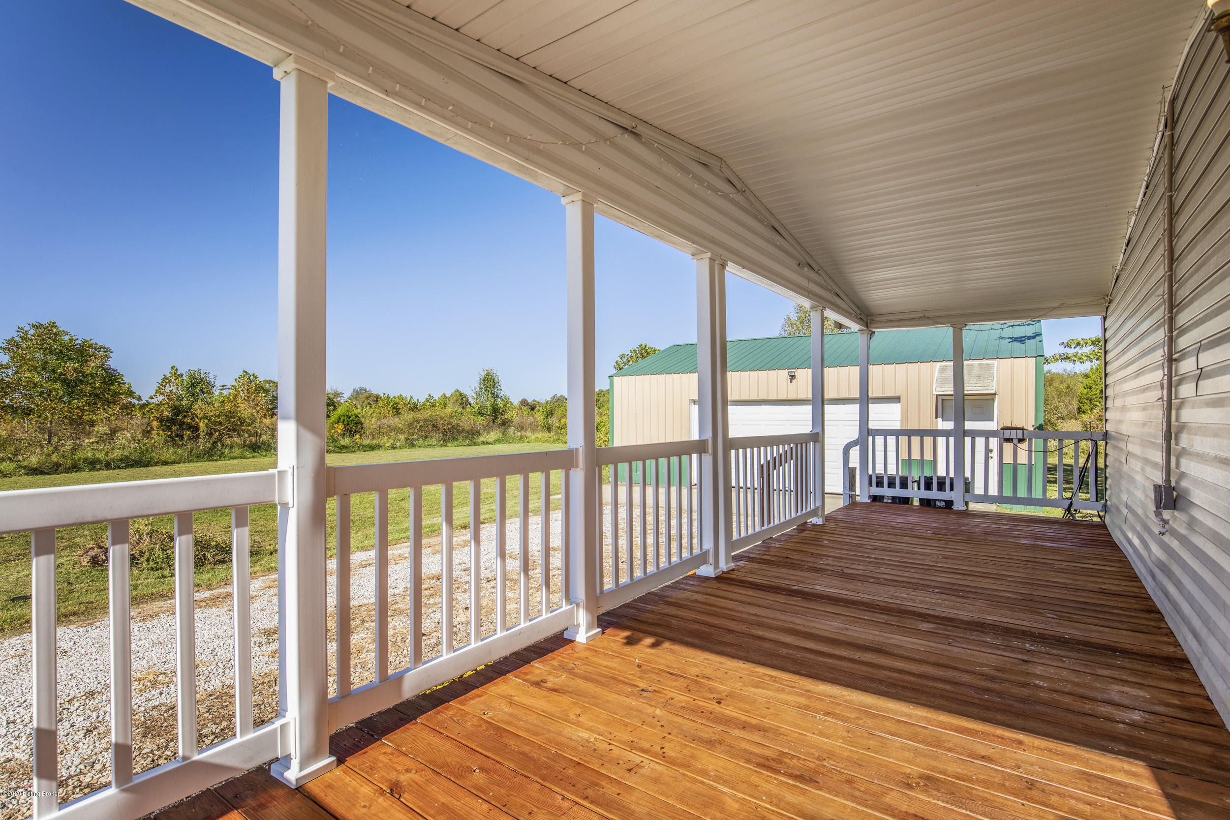 1203 Morrison Road Big Clifty, KY 42712 - Photo 25 of 33 Covered Deck area for your outdoor seating and table