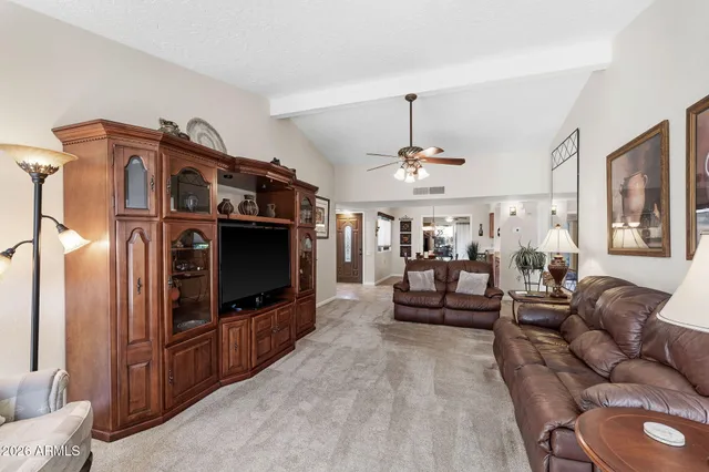 a bed room with a bed and a window