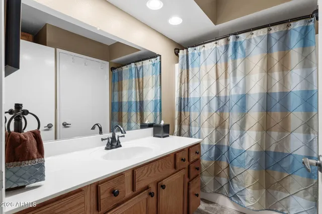 a front view of a house with a yard table and chairs