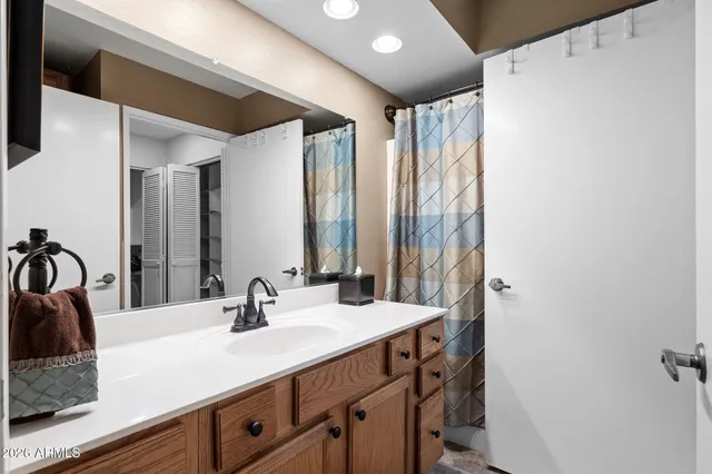 a view of a house with backyard sitting area and porch