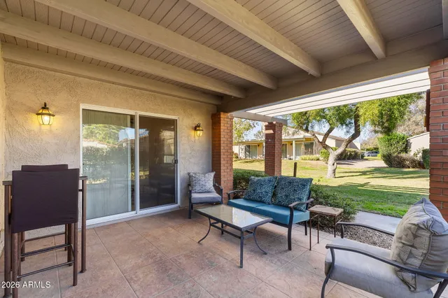 a view of a livingroom with furniture and window