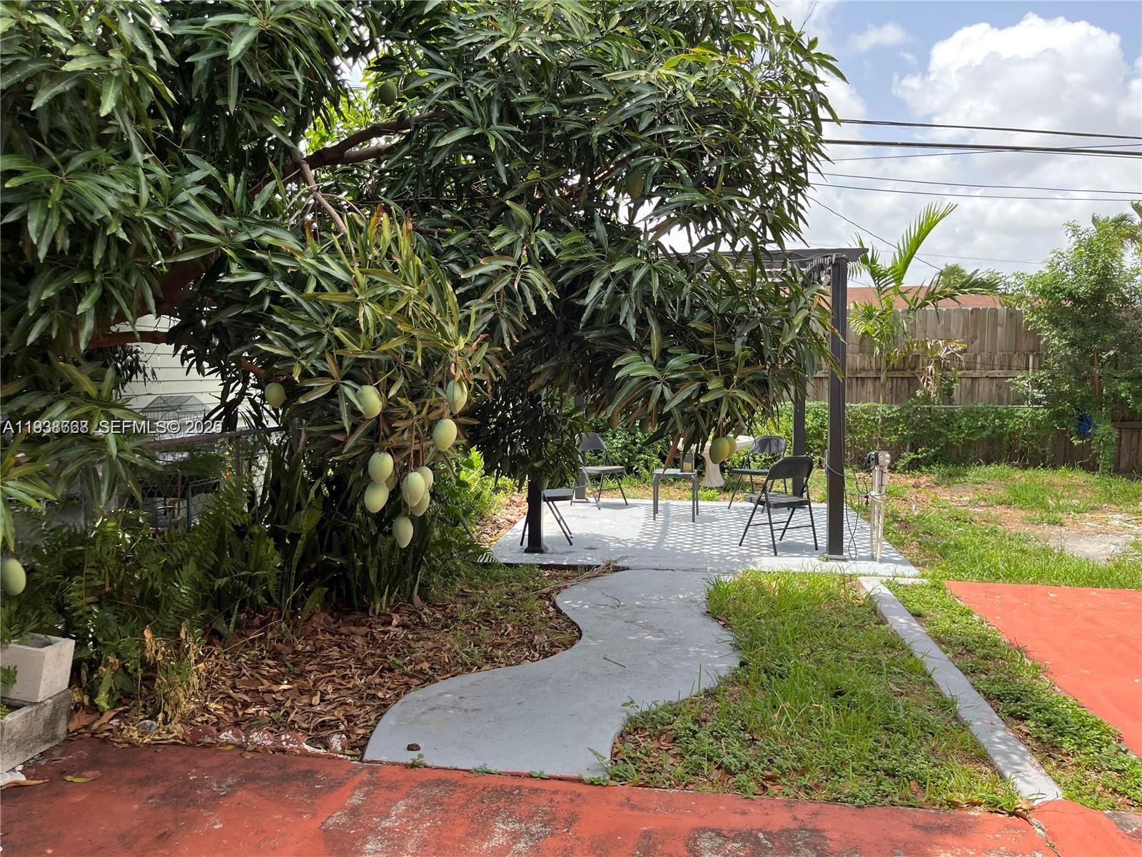 1014 West 68th Street Hialeah, FL 33014 - Photo 31 of 40 a view of a park with large trees