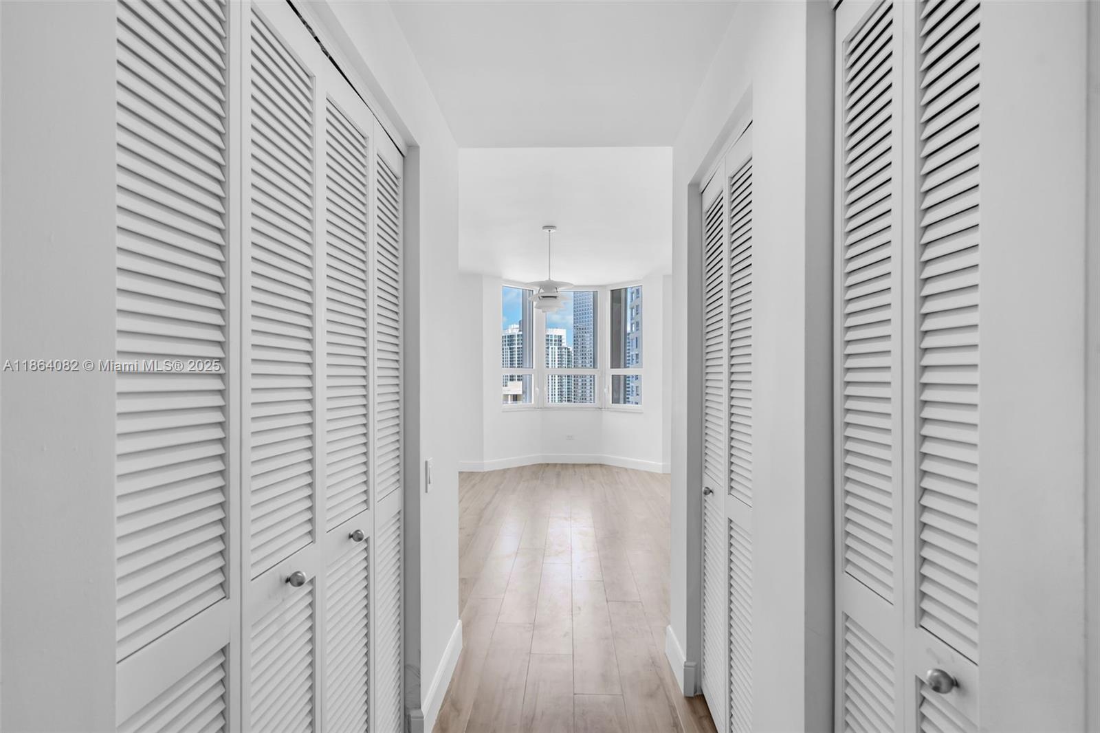 808 Brickell Key Drive, Unit 3205 Miami, FL 33131 - Photo 22 of 51 a view of workspace with wooden floor