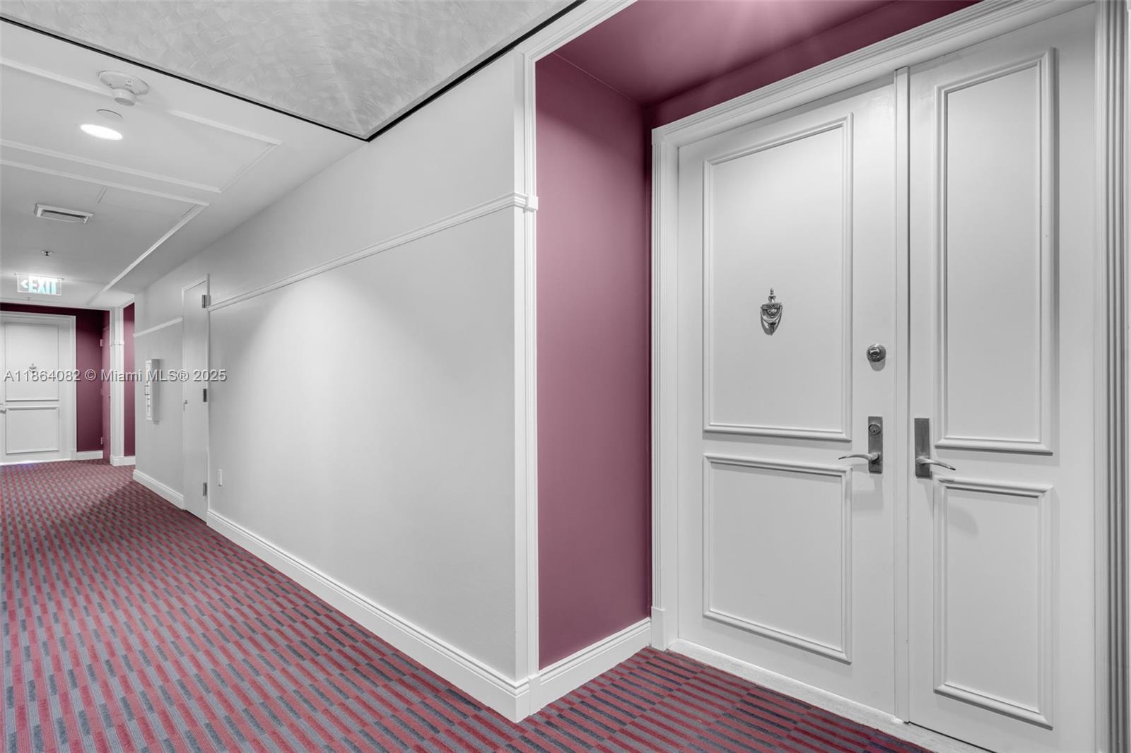 808 Brickell Key Drive, Unit 3205 Miami, FL 33131 - Photo 35 of 51 a view of a hallway with wooden floor