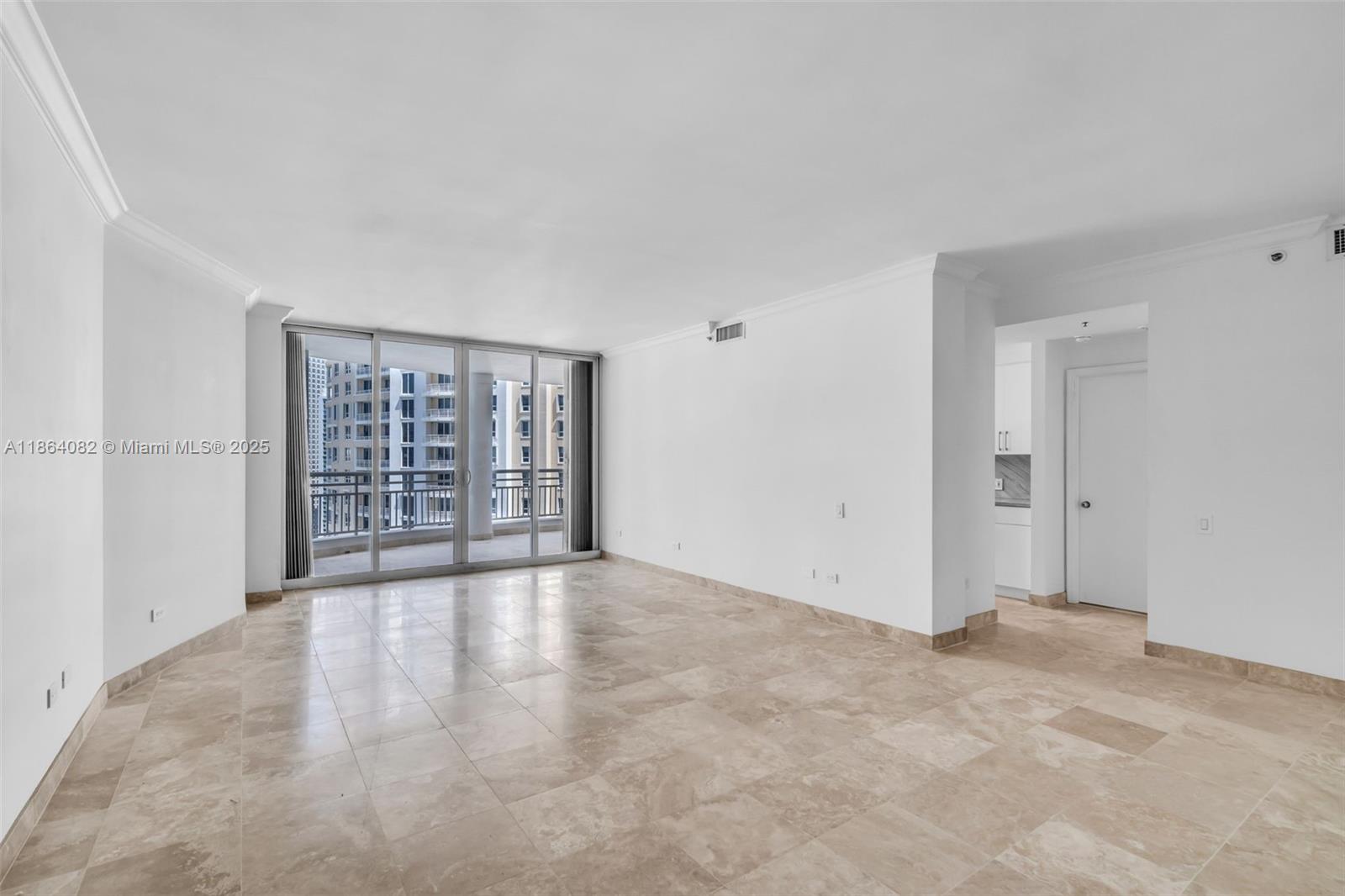 808 Brickell Key Drive, Unit 3205 Miami, FL 33131 - Photo 4 of 51 wooden floor in an empty room with a window