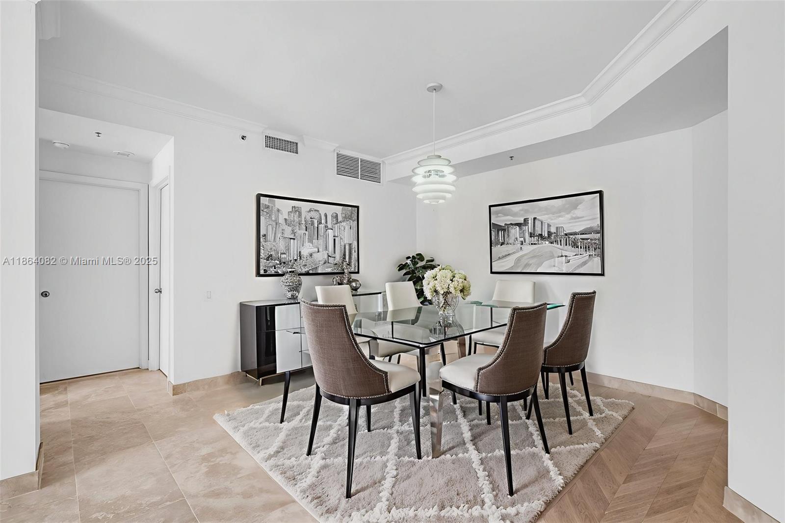 808 Brickell Key Drive, Unit 3205 Miami, FL 33131 - Photo 10 of 51 a view of a dining room with furniture