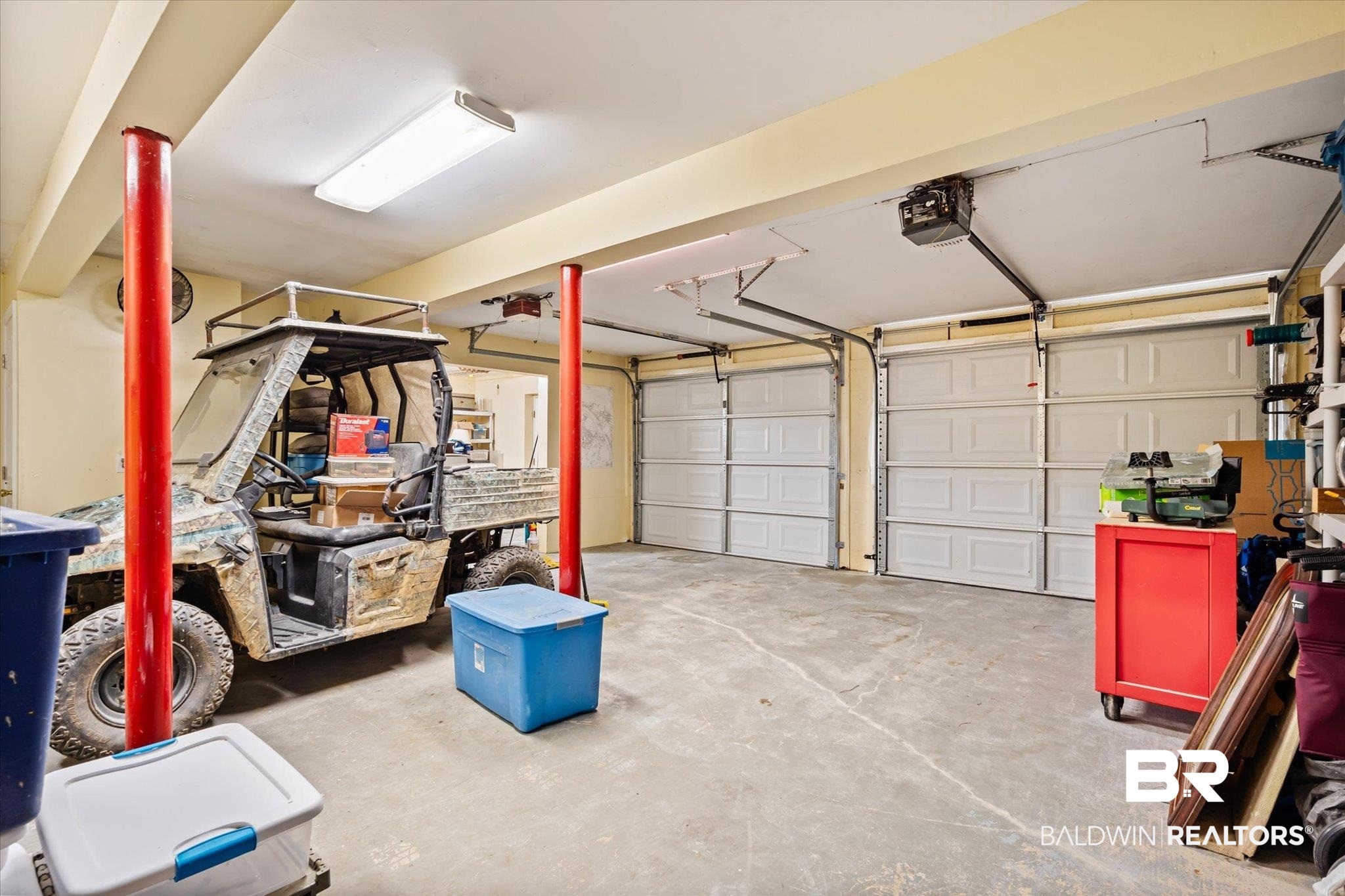 4930 River Trace Theodore, AL 36582 - Photo 32 of 57 Garage featuring a garage door opener