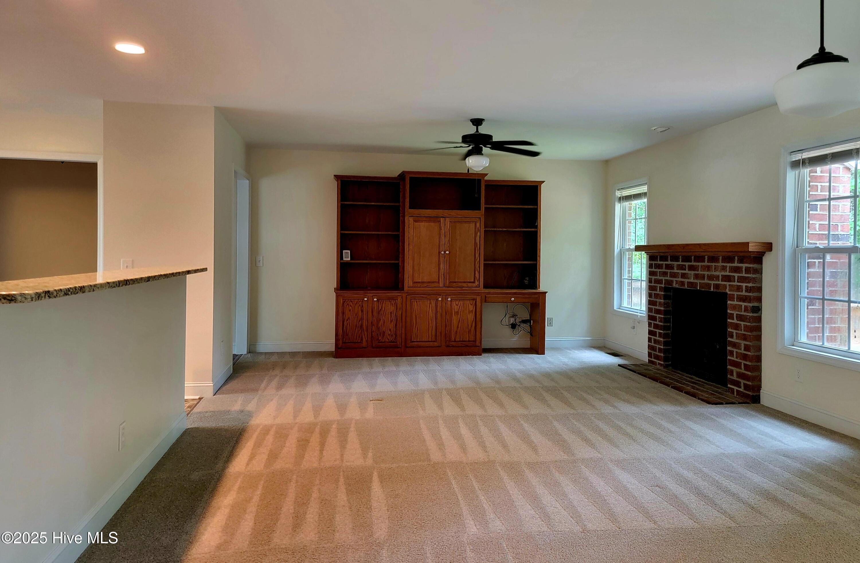 122 Hill Creek Road Chocowinity, NC 27817 - Photo 11 of 50 Built-ins and cozy fireplace