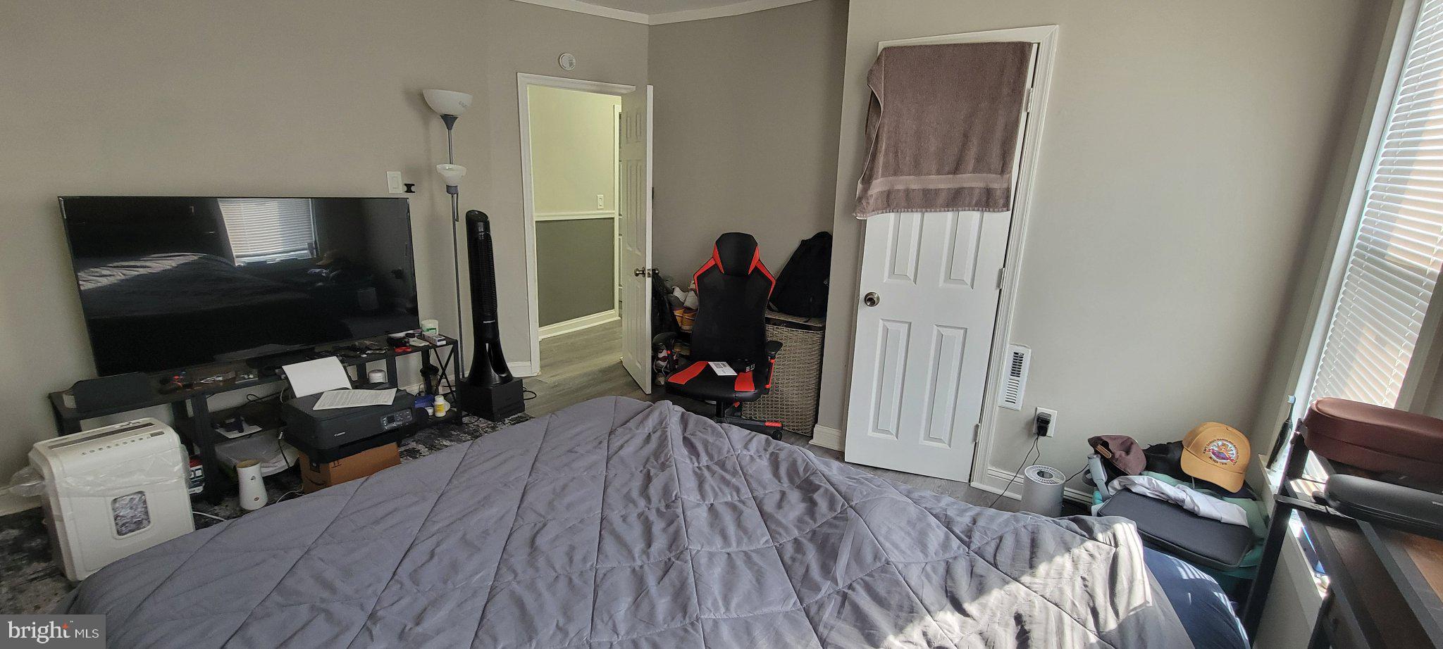 209 North 10th Street Darby, PA 19023 - Photo 23 of 26 Cozy bedroom with modern touches.