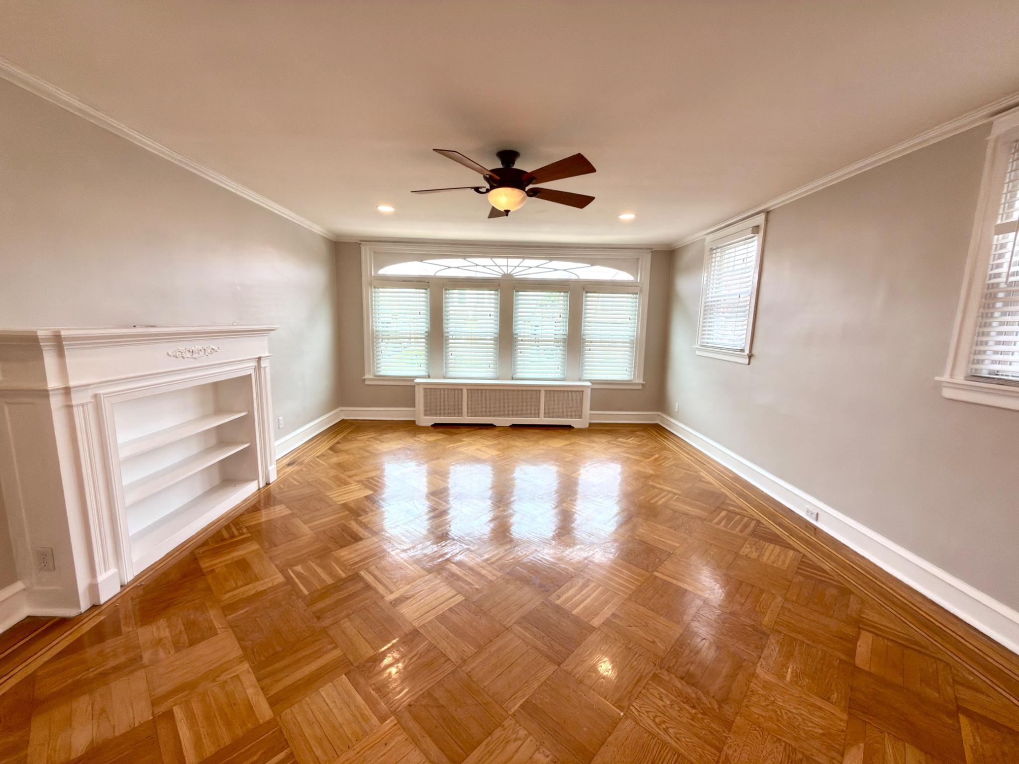 1723 Chelsea Road Elkins Park, PA 19027 - Photo 9 of 38 wooden floor in an empty room with a window