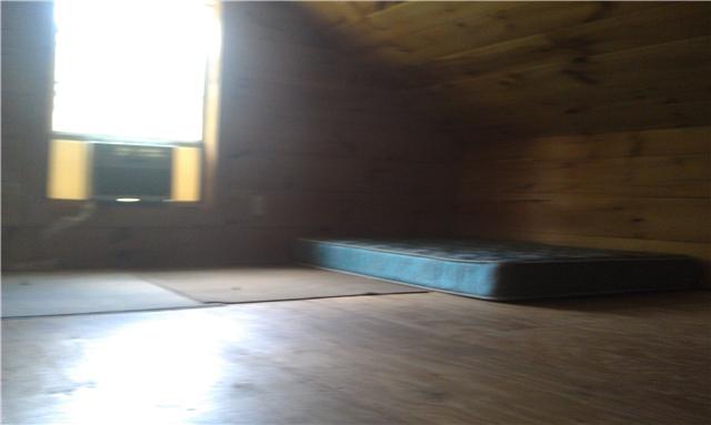 34 Vaughn Staggs Road Summertown, TN 38483 - Photo 20 of 20 attic with heat and window air, floored great for storage, extra bedroom or play area.