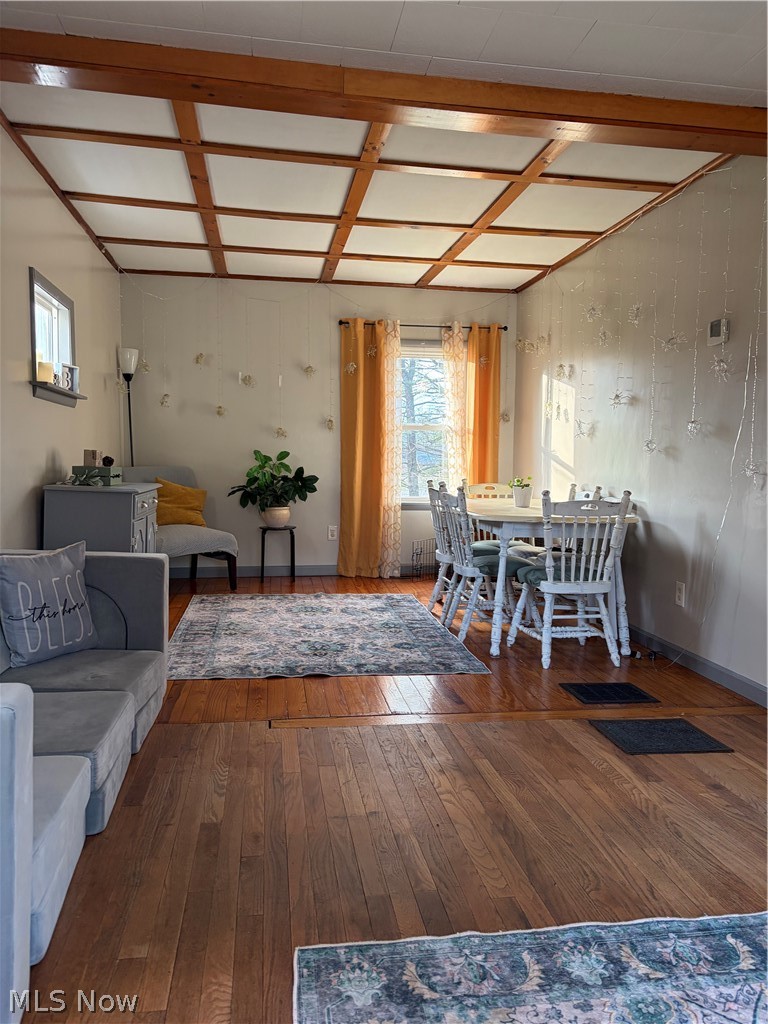 3719 Holmes Road Cambridge, OH 43725 - Photo 4 of 20 Dining space featuring dark wood-style floors and baseboards