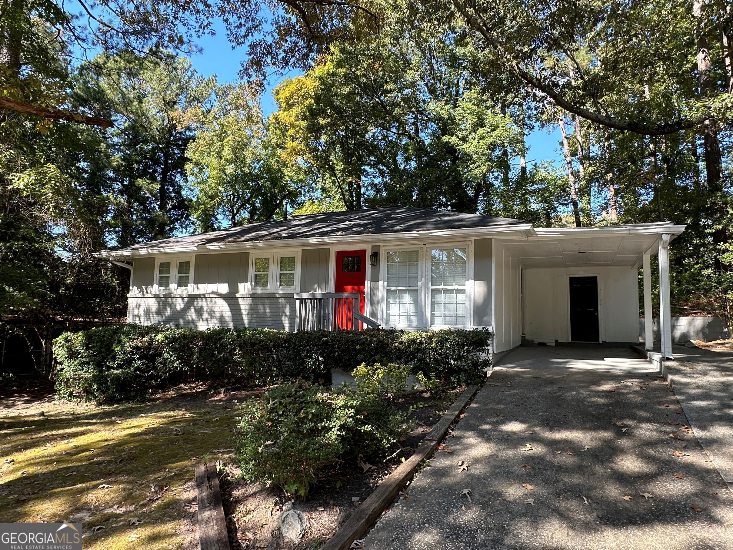 3059 McKenzie Road East Point, GA 30344 - Photo 1 of 1 a front view of house with yard and green space