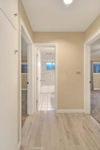 a view of a bathroom with sink and mirror