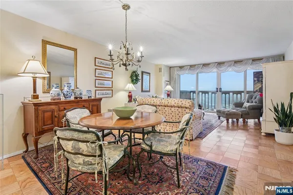 a view of a dining room with furniture