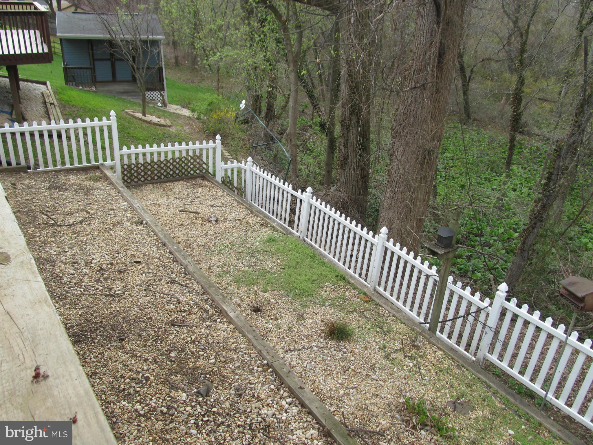 54 Yew Road Baltimore, MD 21221 - Photo 3 of 28 a view of a garden