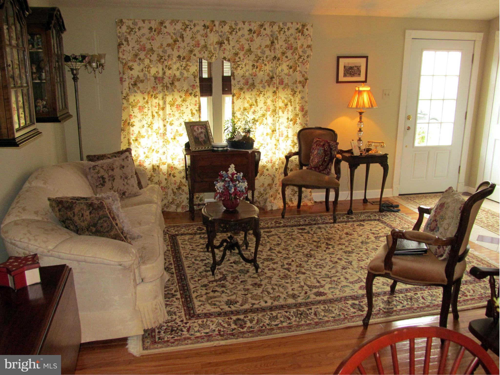 54 Yew Road Baltimore, MD 21221 - Photo 5 of 28 a living room with furniture and a window