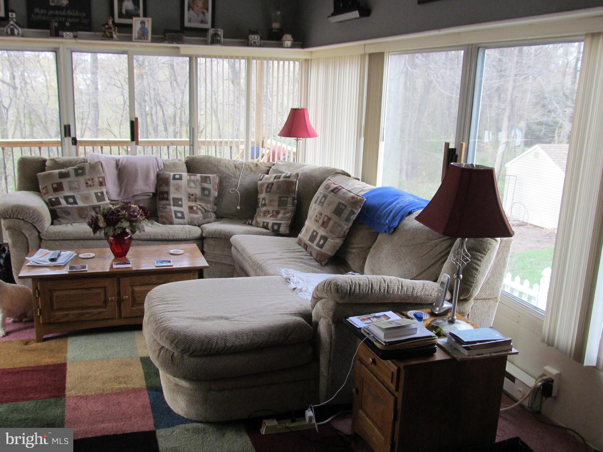 54 Yew Road Baltimore, MD 21221 - Photo 8 of 28 a living room with furniture and a window