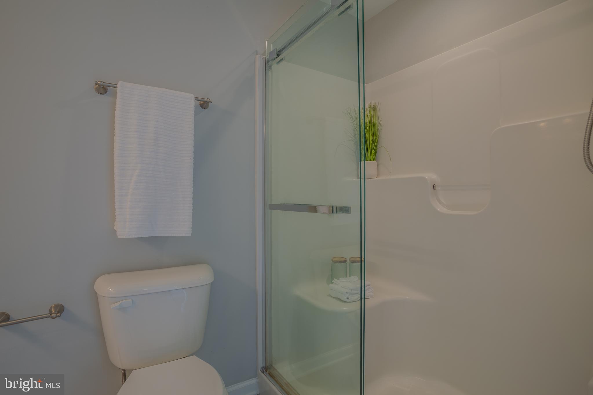 153 Dimension Road Inwood, WV 25428 - Photo 21 of 51 Full Bathroom/ Walk-in Shower Primary Suite