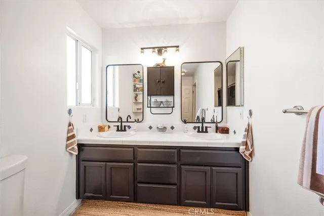 a view of a workspace with furniture