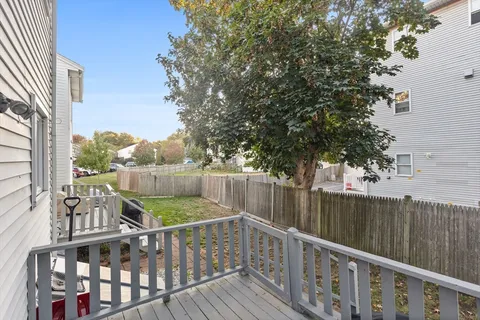 a view of balcony with furniture
