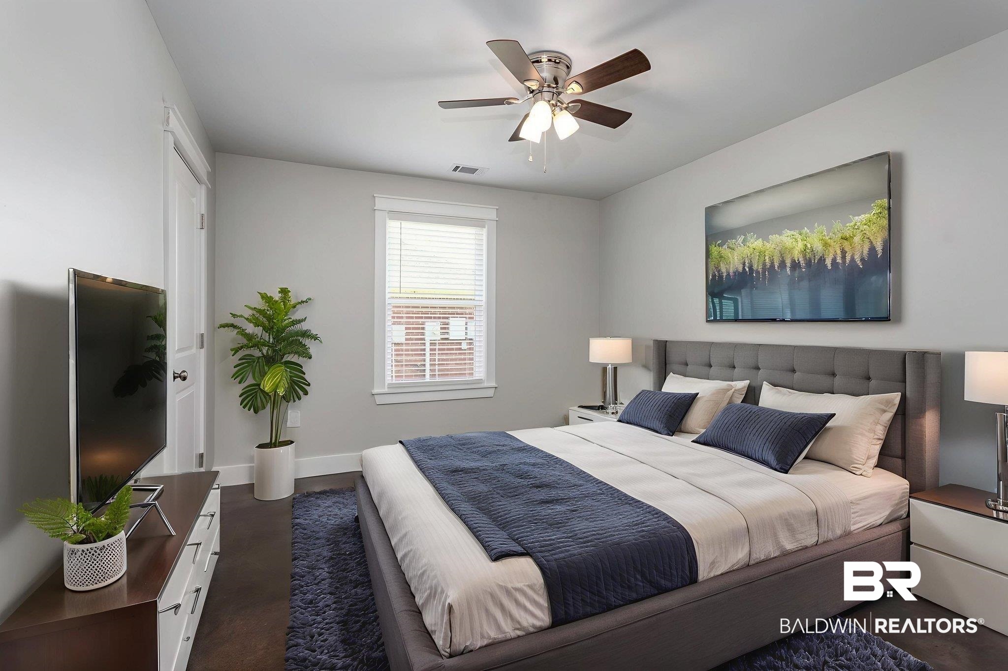 17126 Sugar Loop Foley, AL 36535 - Photo 14 of 28 Bedroom featuring concrete flooring and a ceiling fan